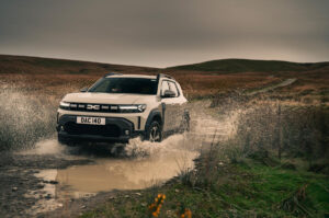 dacia duster review off roading through a puddle 0