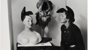 1. Gala with Shoe Hat by Andre Caillet