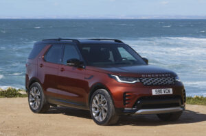 2026 land rover discovery parked on beach